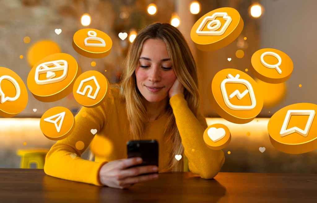 Mulher usando o celular enquanto ícones de redes sociais aparecem ao redor, representando interação online e presença digital.